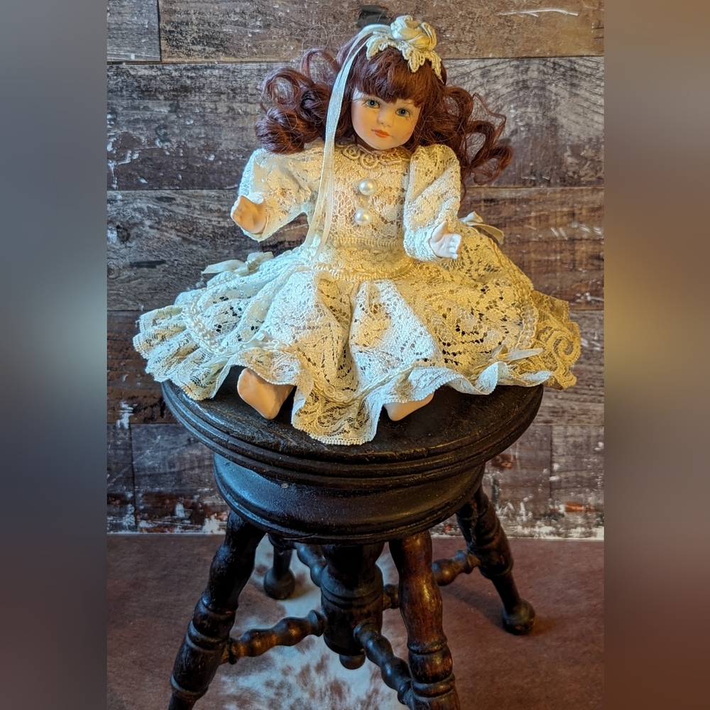 Vintage Porcelain Doll With Brown Curly Long Hair and Blue Eyes